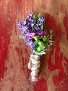 Boutonnière on rustic background